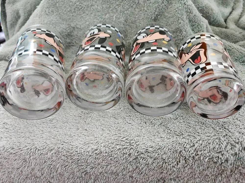 This is a set of vintage Goofy drinking glasses manufactured by Anchor Hocking f